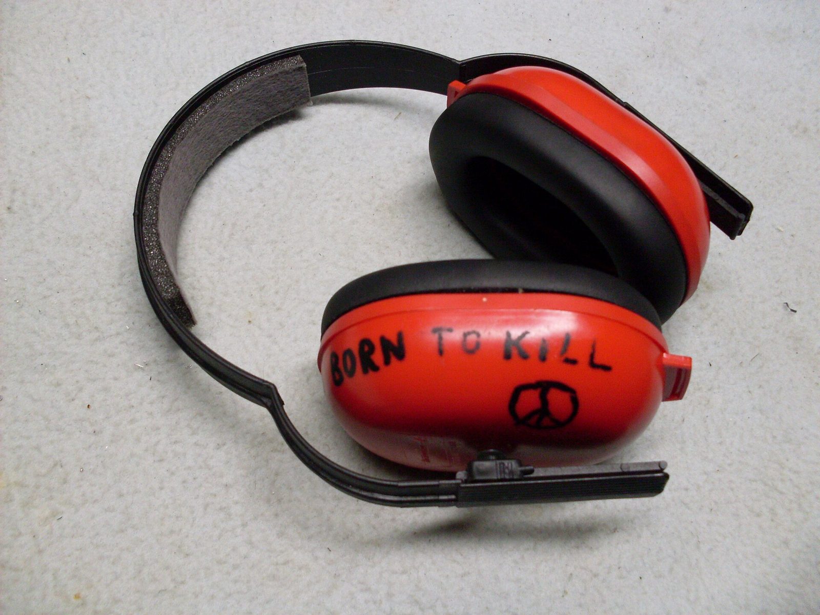 Worker wearing hearing protection earmuffs