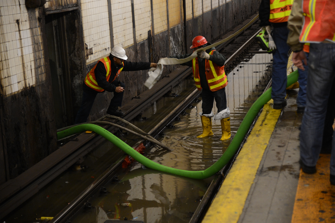 Burst water main flooding a street